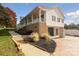 House exterior with driveway and landscaping at 104 Vista Dr, Davidson, NC 28036