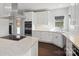 Modern kitchen with island, stainless steel appliances, and quartz countertops at 104 Vista Dr, Davidson, NC 28036