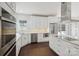 Spacious kitchen with white cabinets and stainless steel appliances at 104 Vista Dr, Davidson, NC 28036