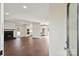 Open living room and kitchen area with hardwood floors at 104 Vista Dr, Davidson, NC 28036