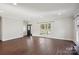 Spacious living room with hardwood floors and lots of natural light at 104 Vista Dr, Davidson, NC 28036