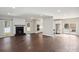 Open floor plan with living room, kitchen, and access to backyard at 104 Vista Dr, Davidson, NC 28036
