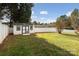 White shed with black trim in backyard at 104 Vista Dr, Davidson, NC 28036