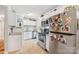 Bright kitchen with white cabinets, granite countertops, and stainless steel appliances at 1065 14Th Nw Ave, Hickory, NC 28601