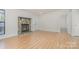 Living room with stone fireplace and hardwood floors at 11236 Mallard Crossing Dr, Charlotte, NC 28262