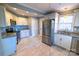 Kitchen with white cabinets, stainless steel appliances, and granite countertops at 1228 Matheson Ave, Charlotte, NC 28205