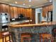 Modern kitchen with ample cabinetry, a breakfast bar, and stainless steel appliances at 1327 Moonshadow Ln, Shelby, NC 28150