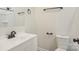 Simple bathroom with white vanity, toilet and shower at 1423 Roseland Dr, Lincolnton, NC 28092