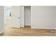 Bedroom with light walls, wood-look floors, and a closet with sliding doors at 1423 Roseland Dr, Lincolnton, NC 28092