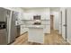 Modern kitchen with white cabinets, granite countertops, and stainless steel appliances at 1423 Roseland Dr, Lincolnton, NC 28092