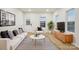Bright living room featuring a comfy sofa and stylish decor at 1423 Roseland Dr, Lincolnton, NC 28092