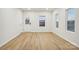 Spacious bedroom with hardwood floors and large windows at 1423 Roseland Dr, Lincolnton, NC 28092