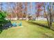 Spacious backyard with patio, playset, and a relaxing hammock at 1882 Sardis Dr, Lancaster, SC 29720