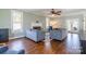 Spacious living room with hardwood floors, fireplace, and lots of natural light at 1882 Sardis Dr, Lancaster, SC 29720