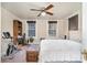 Bedroom with carpeted floor, exercise bike and king bed at 228 Sugar Loaf Dr, Troy, NC 27371