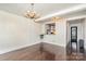 Bright dining area with a view and access to the kitchen at 228 Sugar Loaf Dr, Troy, NC 27371