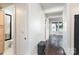 Hallway with wood floors and a view of lake from the end at 228 Sugar Loaf Dr, Troy, NC 27371