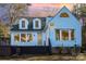 White house with deck, hot tub, and lake view at 228 Sugar Loaf Dr, Troy, NC 27371