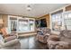 Relaxing living room with lake view and wood floors at 228 Sugar Loaf Dr, Troy, NC 27371