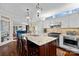 Bright kitchen featuring granite countertops, stainless steel appliances, and an island at 2435 Calais Pl, Charlotte, NC 28211