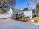 Home exterior with deck and fenced backyard at 2711 Cowles Rd, Charlotte, NC 28208