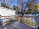 Wooden deck overlooks backyard with shed at 2711 Cowles Rd, Charlotte, NC 28208