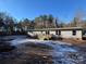 Gray siding home with a deck, and snowy yard at 3553 33Rd Street Ne Dr, Hickory, NC 28601