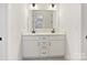 Double vanity bathroom with modern fixtures and a clean design at 3837 Bon Rea Dr, Charlotte, NC 28226