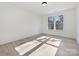 Bright bedroom with hardwood floors and large windows at 3837 Bon Rea Dr, Charlotte, NC 28226