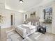 Light-filled bedroom featuring a comfortable bed and hardwood floors at 3837 Bon Rea Dr, Charlotte, NC 28226
