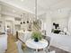 Kitchen features a dining area with a round table and gray chairs at 3837 Bon Rea Dr, Charlotte, NC 28226