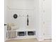Built-in bench with storage in entryway at 3837 Bon Rea Dr, Charlotte, NC 28226