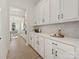 White kitchen with quartz countertops and ample cabinet space at 3837 Bon Rea Dr, Charlotte, NC 28226