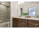 Clean bathroom with double vanity, shower and modern tile at 4003 Bourne Ct # Lot 41, Charlotte, NC 28262