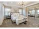 Main bedroom with plush carpet and large windows at 4003 Bourne Ct, Charlotte, NC 28262