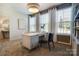 Modern home office with desk, chairs, and built-in shelving at 4003 Bourne Ct # Lot 41, Charlotte, NC 28262