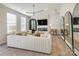 Modern living room with a chic sofa and statement mirrors at 4003 Bourne Ct # Lot 41, Charlotte, NC 28262