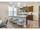 Modern kitchen with island and breakfast bar seating at 4011 Bourne Ct, Charlotte, NC 28262