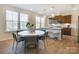 Open concept kitchen with island and breakfast area at 4011 Bourne Ct, Charlotte, NC 28262