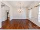 Formal dining room featuring hardwood floors and wainscoting at 4509 Long Cove Dr, Denver, NC 28037