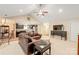 Open living area with vaulted ceiling, leather sectional, and access to kitchen at 914 Hidden Creek Cir, Salisbury, NC 28147