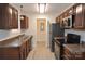 Modern kitchen with stainless steel appliances and wood cabinets at 102 Hardin St # 2, Chester, SC 29706