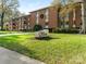 Brick building with landscaping and address marker at 1300 Queens Rd # 316, Charlotte, NC 28207