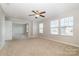 Large main bedroom with ceiling fan and carpet at 15019 Ockeechobee Ct, Mint Hill, NC 28227