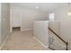 Upstairs hallway with carpeted floor and access to bedrooms at 15019 Ockeechobee Ct, Mint Hill, NC 28227