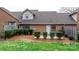 Private patio and small backyard with landscaping at 204 W 18Th St, Newton, NC 28658