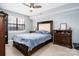 Bright bedroom with a double bed, dresser and ceiling fan at 204 W 18Th St, Newton, NC 28658
