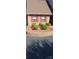 Brick ranch home with red shutters and well-maintained landscaping at 204 W 18Th St, Newton, NC 28658