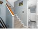 Staircase leading to upper level with a bathroom visible at the top of the stairs at 204 W 18Th St, Newton, NC 28658