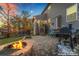 Cozy backyard patio with fire pit and grill, perfect for entertaining at 2155 Galloway Ln, Concord, NC 28025